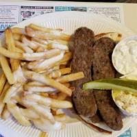 Gyro Platter · Served with pita. French fries, Greek salad & tzatziki sauce