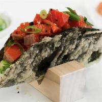 Salmon Nori Taco · Our Salmon Nori Tacos are stuffed with Atlantic salmon, sliced cucumbers, avocado, sesame se...