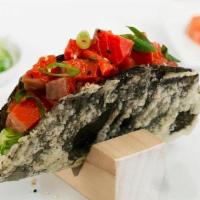 Tuna Nori Taco · Our Tuna Nori Tacos are stuffed with ahi tuna, sliced cucumber, avocado, sushi rice topped o...