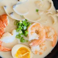 Seafood Mi Xian · Pork broth with old bay seasoning, Garnish with shrimp, squid, clam, lobster meat, scallions...