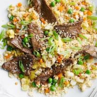 Beef Fried Rice · Beef fried rice with egg, scallion, peas, corn and carrot.