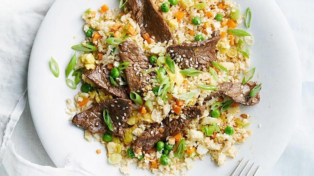 Beef Fried Rice · Beef fried rice with egg, scallion, peas, corn and carrot.