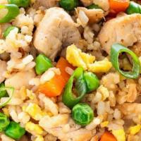 Chicken Fried Rice · Chicken fried rice with egg, scallion, peas, corn and carrot.