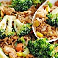 Vegetable Fried Rice · Vegetable fried rice with scallion, egg,  peas, broccoli
and carrots.