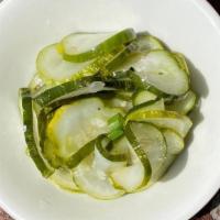 Side Of Pickled Cucumbers • · 4 ounce side cup of pickled cucumbers.