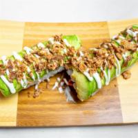 White Dragon Roll · Minced spiced (not spicy) kani,   wrapped in avocado, topped with a lite mayo dressing, swee...