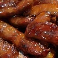 Kache Wings (6 Pieces) · 6 pieces. Choice of BBQ, jerk, Buffalo sauce.