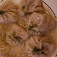 Kothe Momo (8 Pieces) · Lightly pan-fried juicy dumplings filled with mixed vegetables and your choice of meat then ...