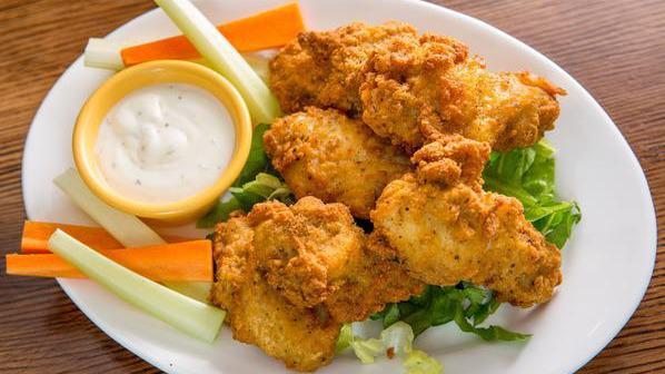 Buffalo Wings · Served with blue cheese dressing.