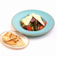Greek Salad · Romaine lettuce, red onion, tomato, green peppers, stuffed grape leaves, kalamata olives, an...