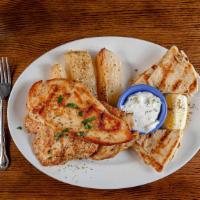 Grilled Chicken Platter · Two tender, perfectly grilled fillets. Served with pita bread, homemade tzatziki sauce, and ...