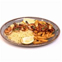 Grilled Shrimp Platter · Served with pita bread and a choice of two sides along with a cup of soup or side salad.