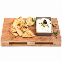 Tzatziki · Vegetarian, gluten-free. Classic Greek yogurt spread with cucumber garlic and fresh dill.