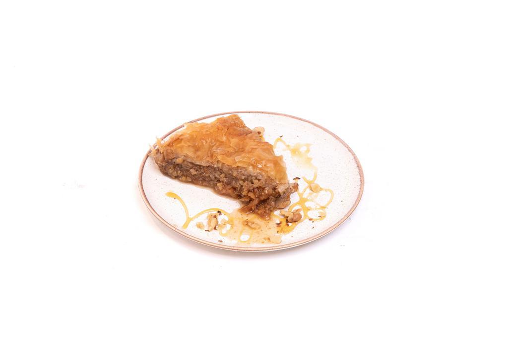 Baklava · Vegetarian. Layered phyllo pastry with chopped walnuts and honey.