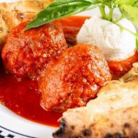 Meatballs · Large beef meatballs slowly cooked in our Italian plum tomato sauce.
