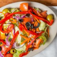 Fresh Tossed Salad · Iceberg lettuce, plum tomatoes, carrots, black, and green olives, peppers, cucumbers, and It...