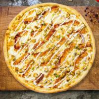Chicken Bacon Ranch Pizza · Ranch drizzle, juicy chicken, bacon, mozzarella, marinara, chopped garlic, and fresh basil b...