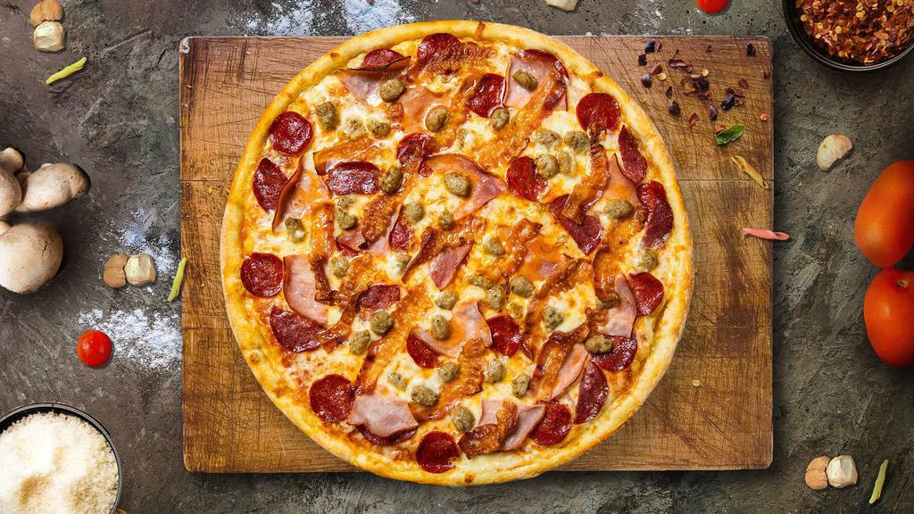 Meat Lover Pizza · Mozzarella, pepperoni, chicken, and sausage baked on a hand-tossed dough.