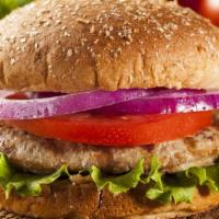 Turkey Burger · Sizzling turkey patty topped with lettuce, tomatoes, and onions.