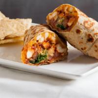 Grilled Chicken Burrito · Grilled chicken, black beans, peppers, brown rice in a homemade salsa & a drizzle of non-dai...