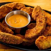 Avocado Fries · Breaded fried slice of avocado.