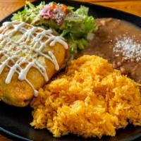 Chimichangas · Deep fried flour tortilla, beans, cheese and choice of meat. Served with rice and beans.