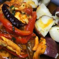 Tilapia A La Veracruzana · Roasted potatoes, fish fillet topped with Veracruzana sauce (onions, chile de Arbol, red pep...