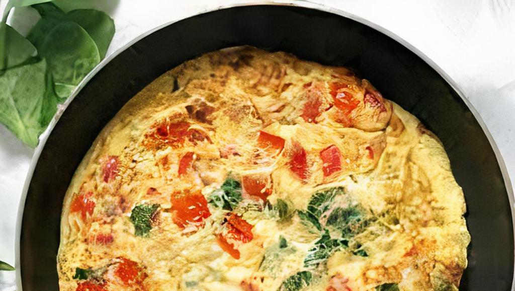 Greek Omelette · Two eggs, feta cheese, onions, tomatoes, pitted olives.
