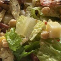 Romaine And Chickpea Salad · Romaine lettuce, chickpeas, red onion, cucumber, tomatoes, olive oil, sea salt, black pepper.