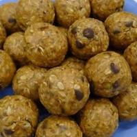 Raisins Energy Balls · Gluten free. Peanut butter, raisins, oats, honey, flax seeds, chia seeds, almonds, and cocon...