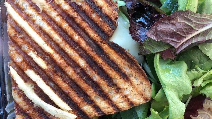 The Vegan Panini · Red onion, spinach, tomatoes, roasted peppers, avocado, sea salt, olive oil, and black pepper. With complimentary side salad (fresh spring mix salad with house balsamic vinaigrette.).