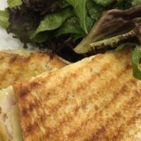 Turkey Swiss Panini · Oven-roasted turkey breast, swiss cheese, and honey mustard. With complimentary side salad (...