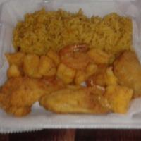 Combo Meal 5 · Three wings, catfish nuggets, five jumbo shrimp, with fries, yellow rice, or coleslaw.