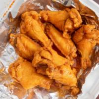 8 Pieces Chicken Wings Meal · Eight pieces chicken wings with fries,  yellow rice., or coleslaw
