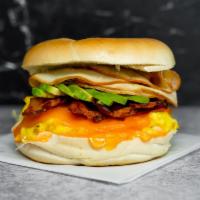 Bagel, Bacon, Turkey, Avocado, Egg, & Cheddar Sandwich · 2 scrambled eggs, melted Cheddar cheese, crispy bacon, sliced smoked turkey, avocado, and Sr...