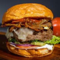 Bacon Burger · Loads of crispy turkey bacon on a seasoned half-pound American beef patty, perfectly cooked ...