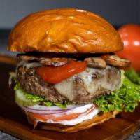 Fungi Fun Guy Burger · Seasoned half-pound American beef patty perfectly cooked to medium, topped with topped with ...