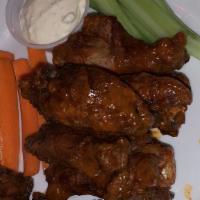 Wings (15) · Add one soda and one fries with extra cost. Choose three dips. Add additional dip with extra...