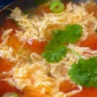 Tomato Egg Drop Soup · Served with crispy noodle.