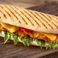Ovengold Panini · Fresh Panini made with Turkey, provolone cheese, mix green tomatoes, balsamigrete. Served on...