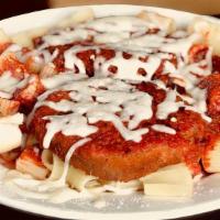 Grilled Chicken Parm · 2 Pieces of Char Broiled Chicken over a bed of Pasta covered in Homemade Sauce with melted M...