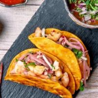 Shrimp Birria Taco · Seared Shrimp Birria. Served with 5-inch tortilla and a side of lime, pickled onions, and ho...