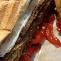 Eggplant Supreme Sandwich · Fried eggplant topped with fresh mozzarella and roasted peppers, drizzled with balsamic vine...