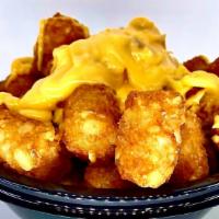 Cheese Tots · Bowl of crunchy tots loaded with cheese.
