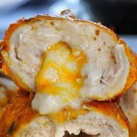 Pollo Al Limon · Chicken breast in lemon butter sauce stuffed with cheese.