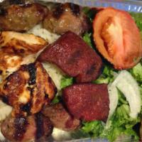 Mixed Platter · Meatball, meatball with cheese, chicken shish kabab, and lamb sausages, serve with house sal...