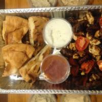 For 5 People · Two Coban salad, one hummus, one Baba ghanoush, one stuffed grape leaves, one 1/2 chicken sh...