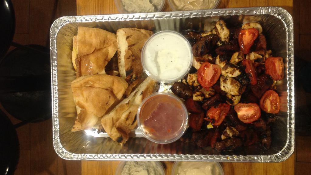 For 5 People · Two Coban salad, one hummus, one Baba ghanoush, one stuffed grape leaves, one 1/2 chicken shish kebab, one 1/2 beef meatball, one 1/2 lamb sausages, 5 pita bread and choice of two ltr soda.