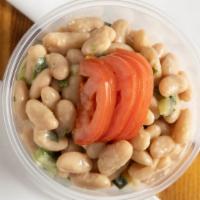 White Beans Salad · White kidney beans, tomatoes, fresh onions with tahini dressing.