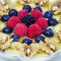 Oatmeal · Whole grain oat, banana, blueberry, strawberry , walnut, honey.